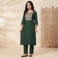 City Center premium ethnic co-ord set in dark green with intricate embroidery on the neckline and three-quarter sleeves