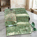 City Center premium green Kanjivaram Tishu silk saree with intricate gold zari floral patterns and embellished pallu