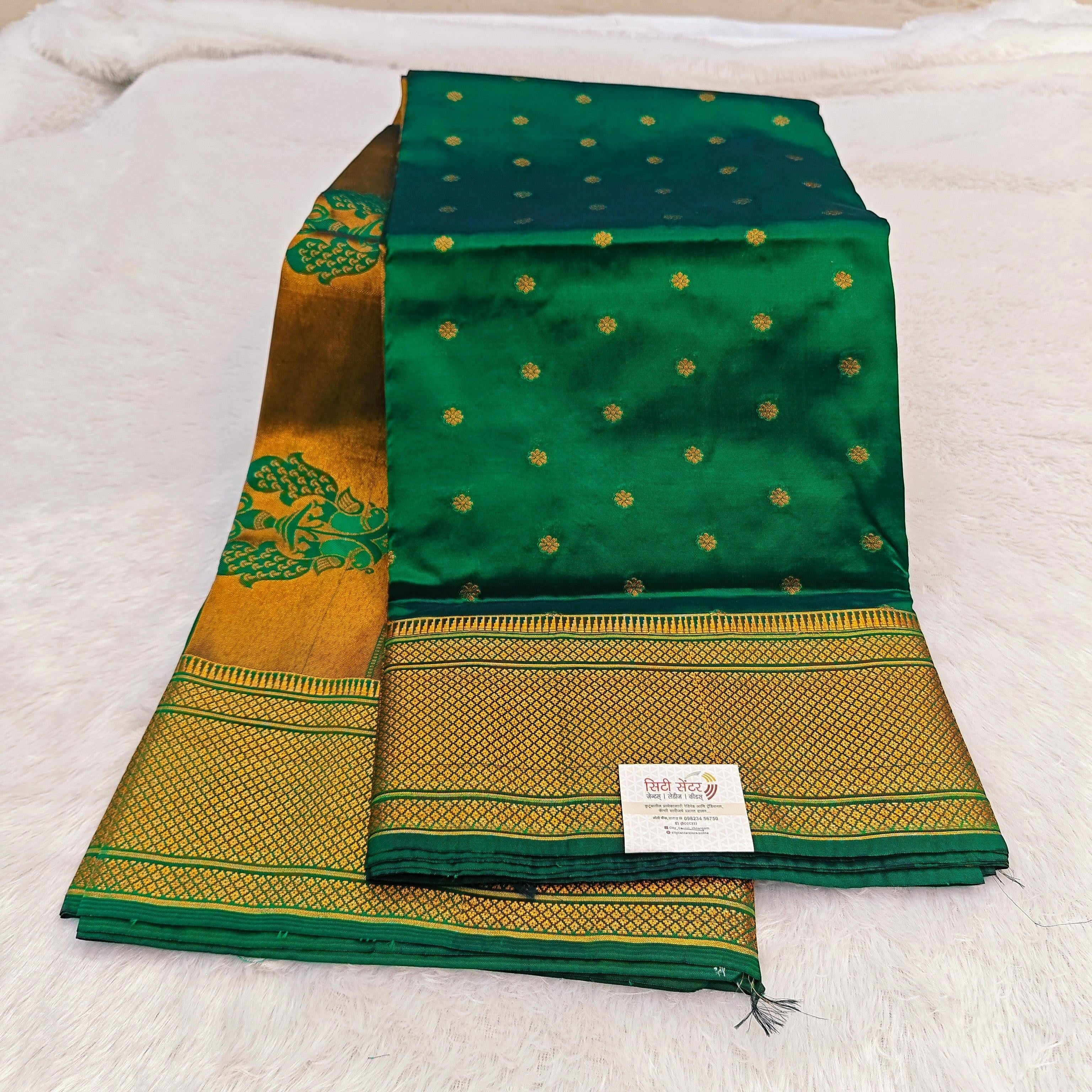 City Center green silk Paithani saree with gold zari peacock border and intricate floral motifs