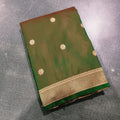City Center Peshwai saree in deep green with gold floral motifs and a traditional woven gold zari border.