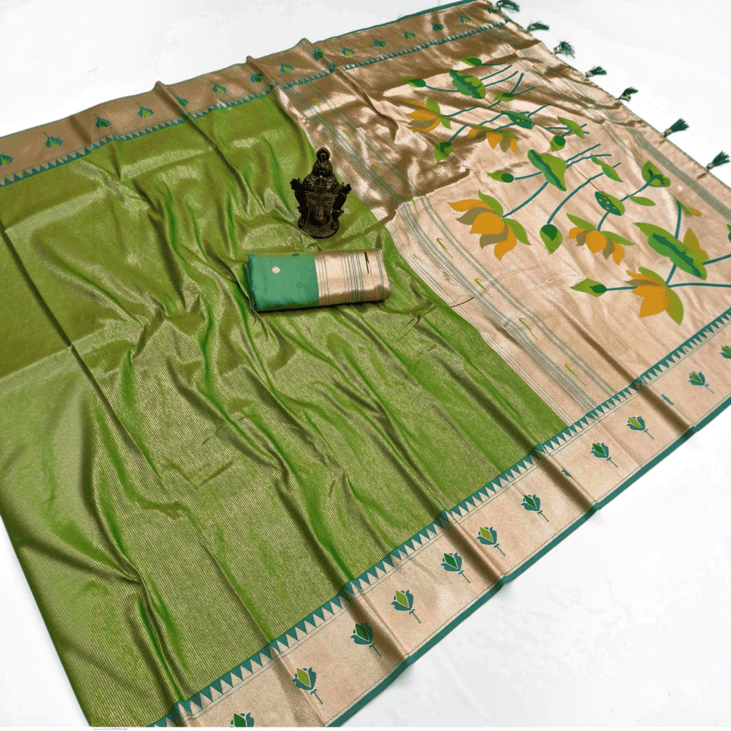 City Center green tissue Paithani saree featuring a metallic gold pallu with intricate lotus motifs and blouse piece.