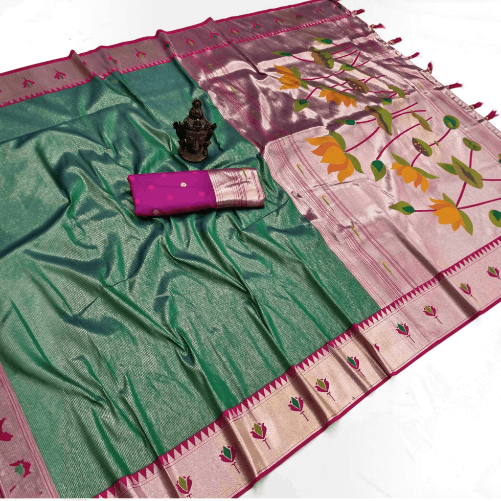 City Center green tissue Paithani saree featuring a metallic sheen, lotus motifs, and a matching pink blouse piece.