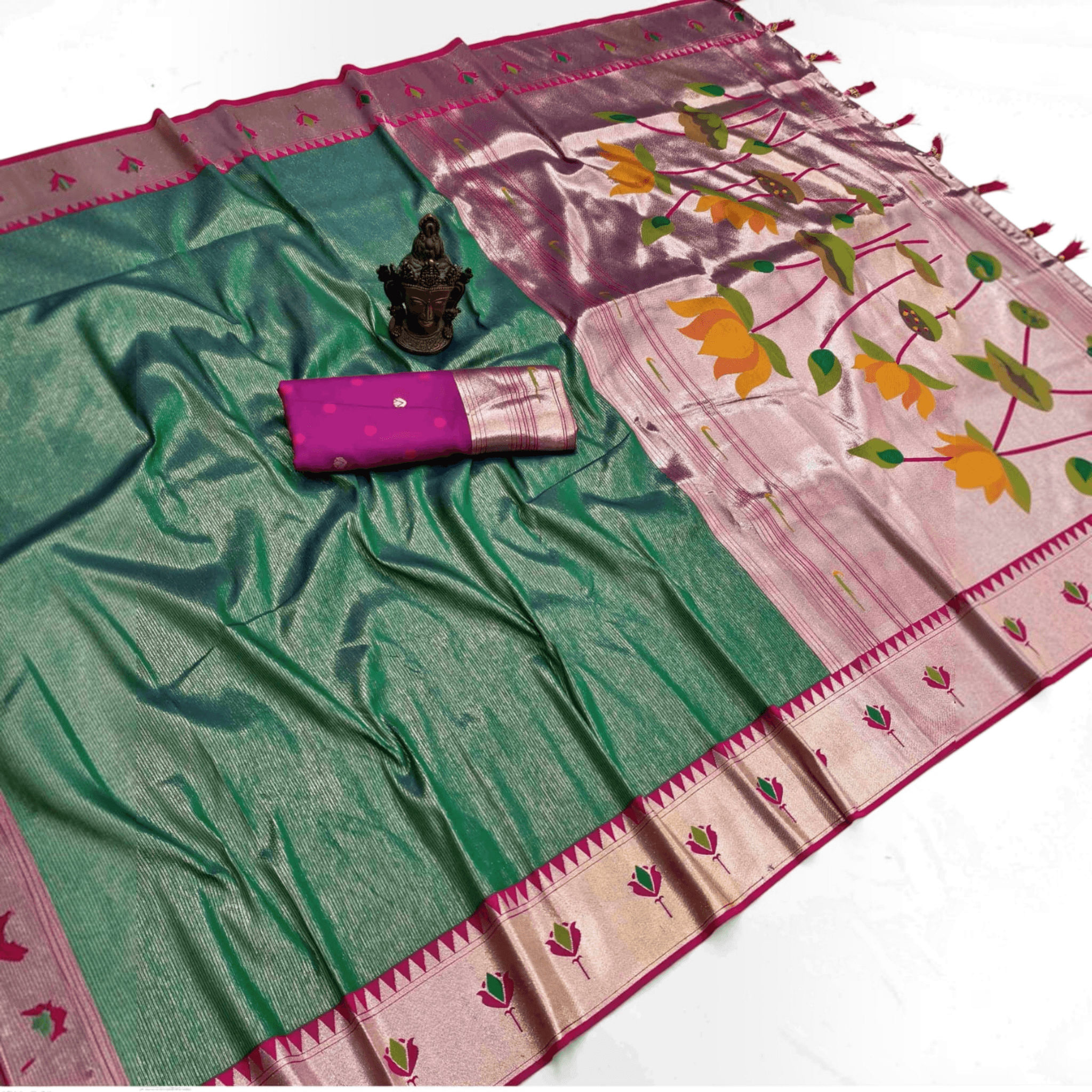 City Center green tissue Paithani saree featuring a metallic sheen, lotus motifs, and a matching pink blouse piece.