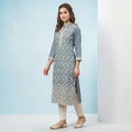 City Center grey straight kurta tunic with intricate white embroidery, mandarin collar, and three-quarter sleeves.