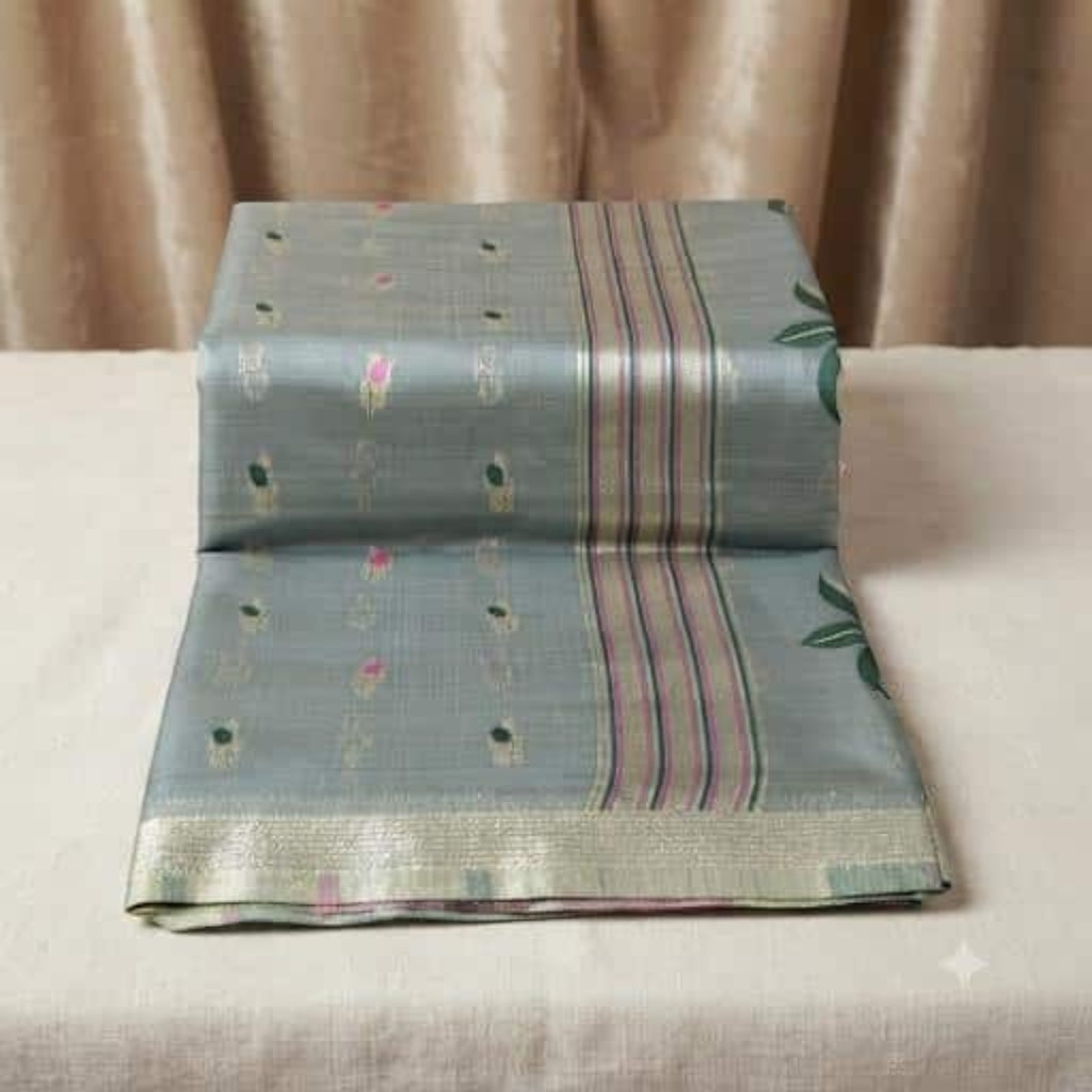 City Center traditional grey silk Jamdani saree featuring intricate hand-woven floral motifs and a metallic border.