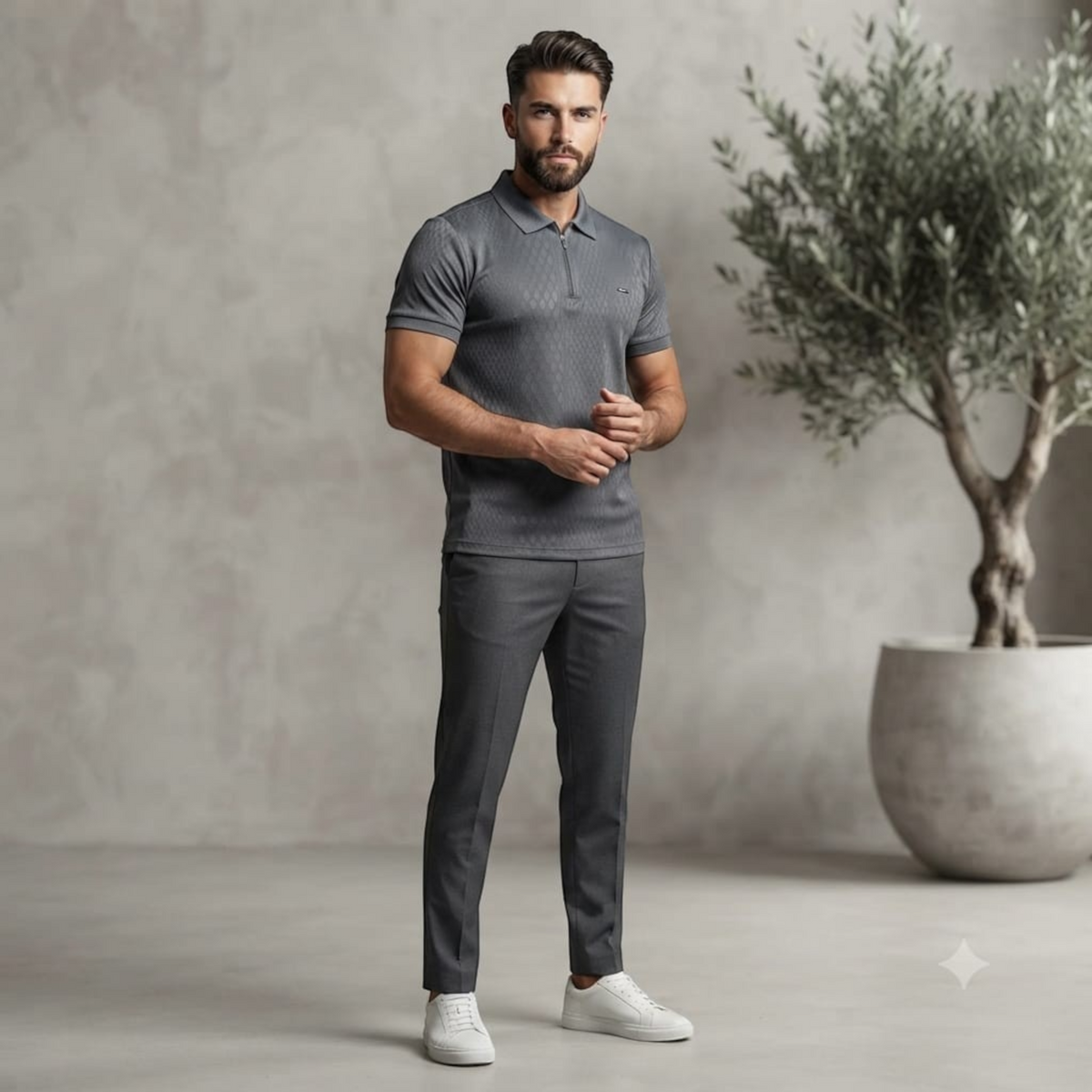 City Center M-Line grey short-sleeve polo shirt with zip collar worn by a man with trousers and white sneakers