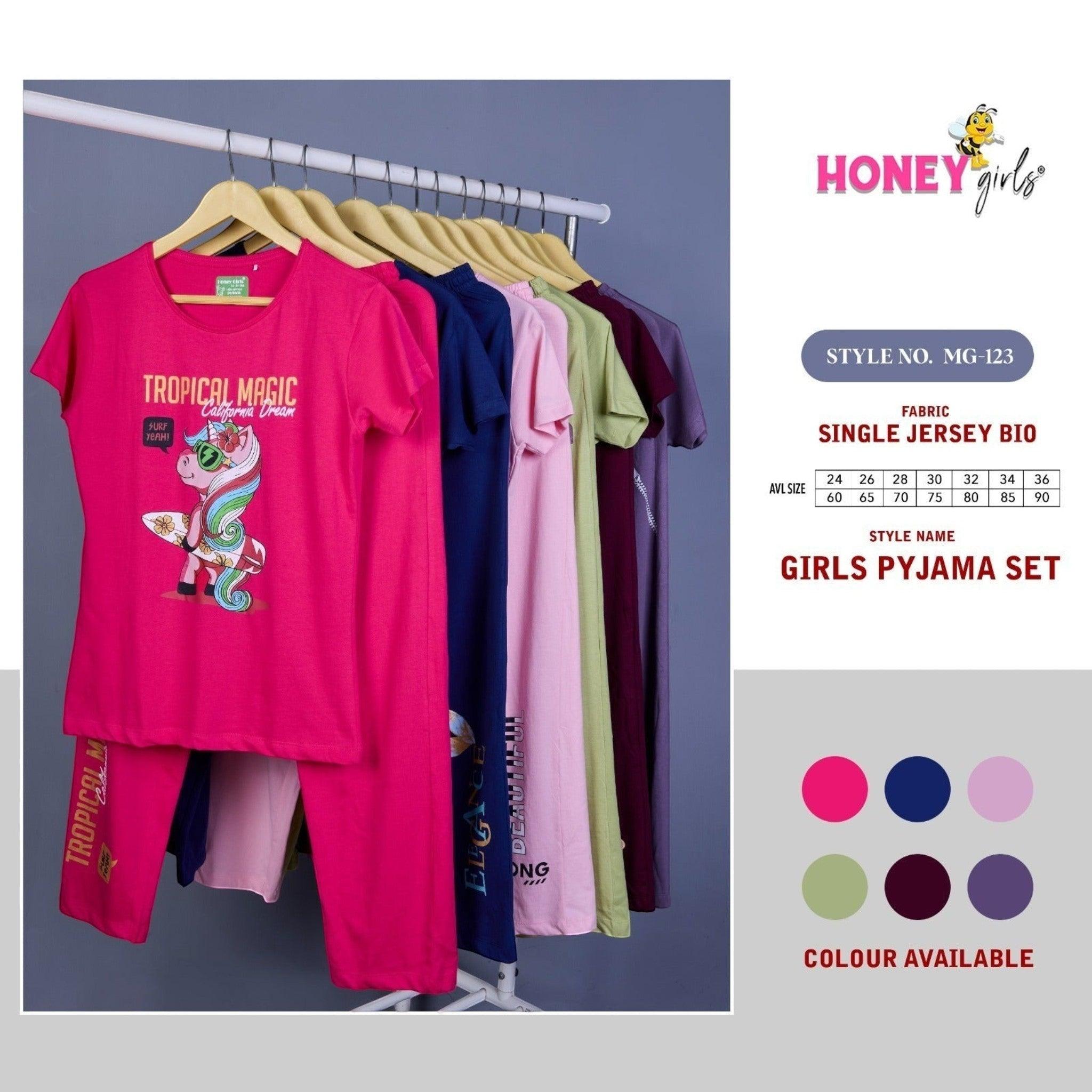 City Center Honey Girls cord set featuring a pink graphic t-shirt and matching pants on a clothing rack