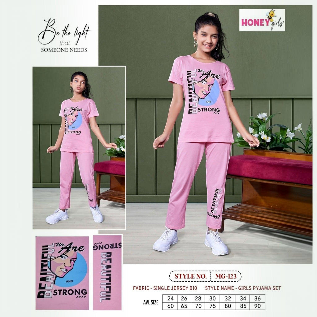 City Center Honey Girls pink cotton jersey pyjama set with graphic print worn by a young girl