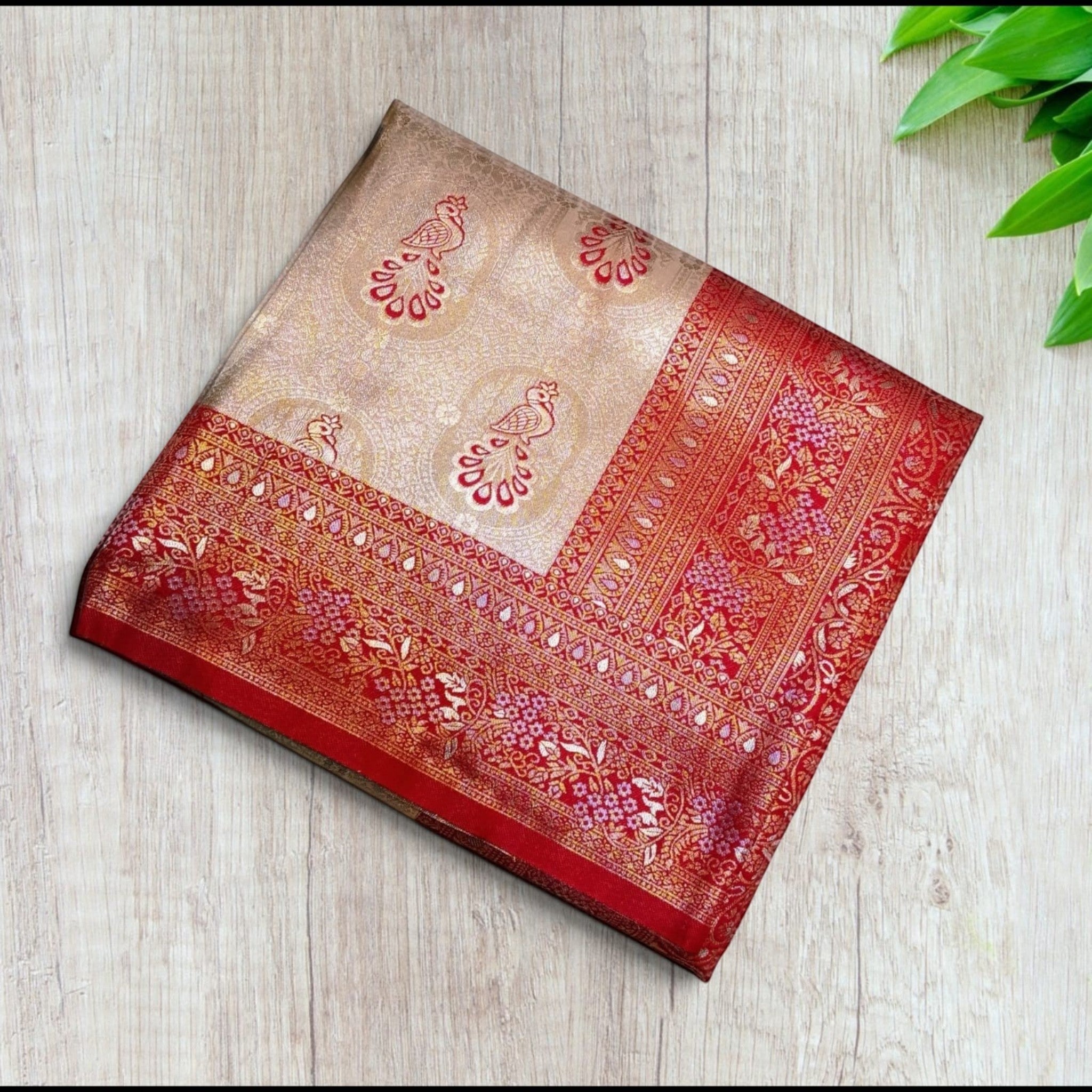 City Center Kanjivaram silk saree in beige and red with intricate gold zari peacock motifs and a wide floral border