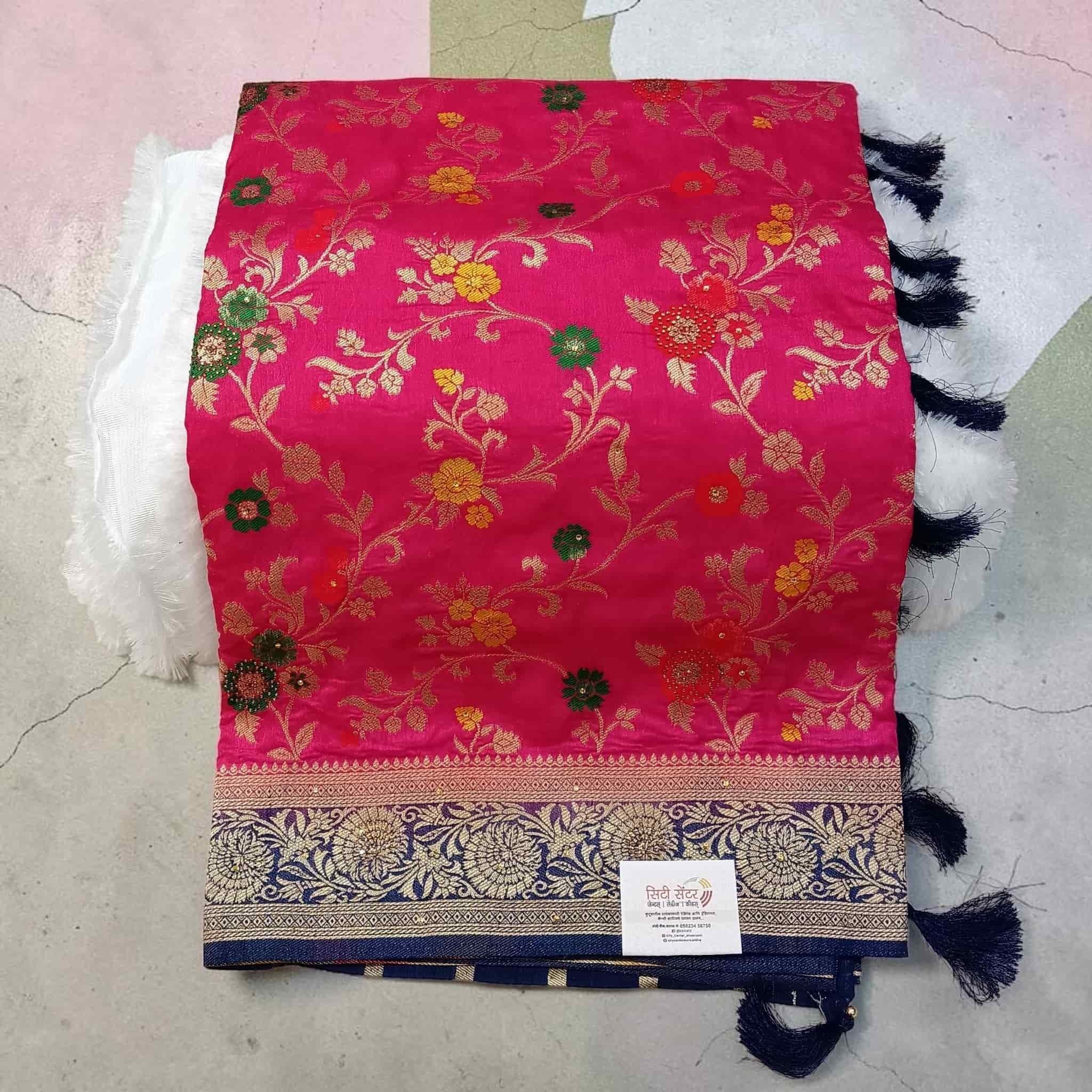 City Center Kathpadar Peshwai saree in vibrant pink with floral patterns, Swarovski crystals, and a navy blue border.