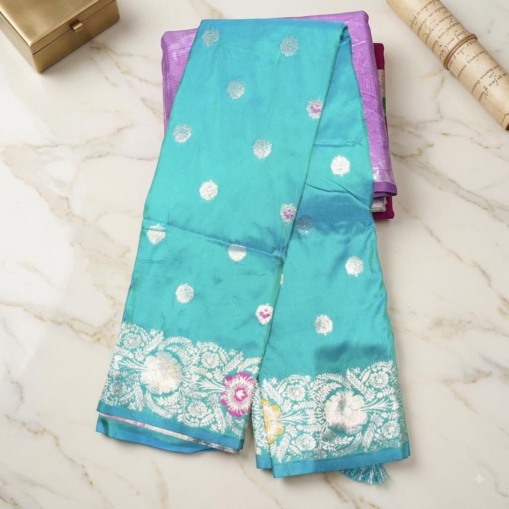 City Center premium Kattpadar silk saree in turquoise with silver zari floral border and polka dot motifs