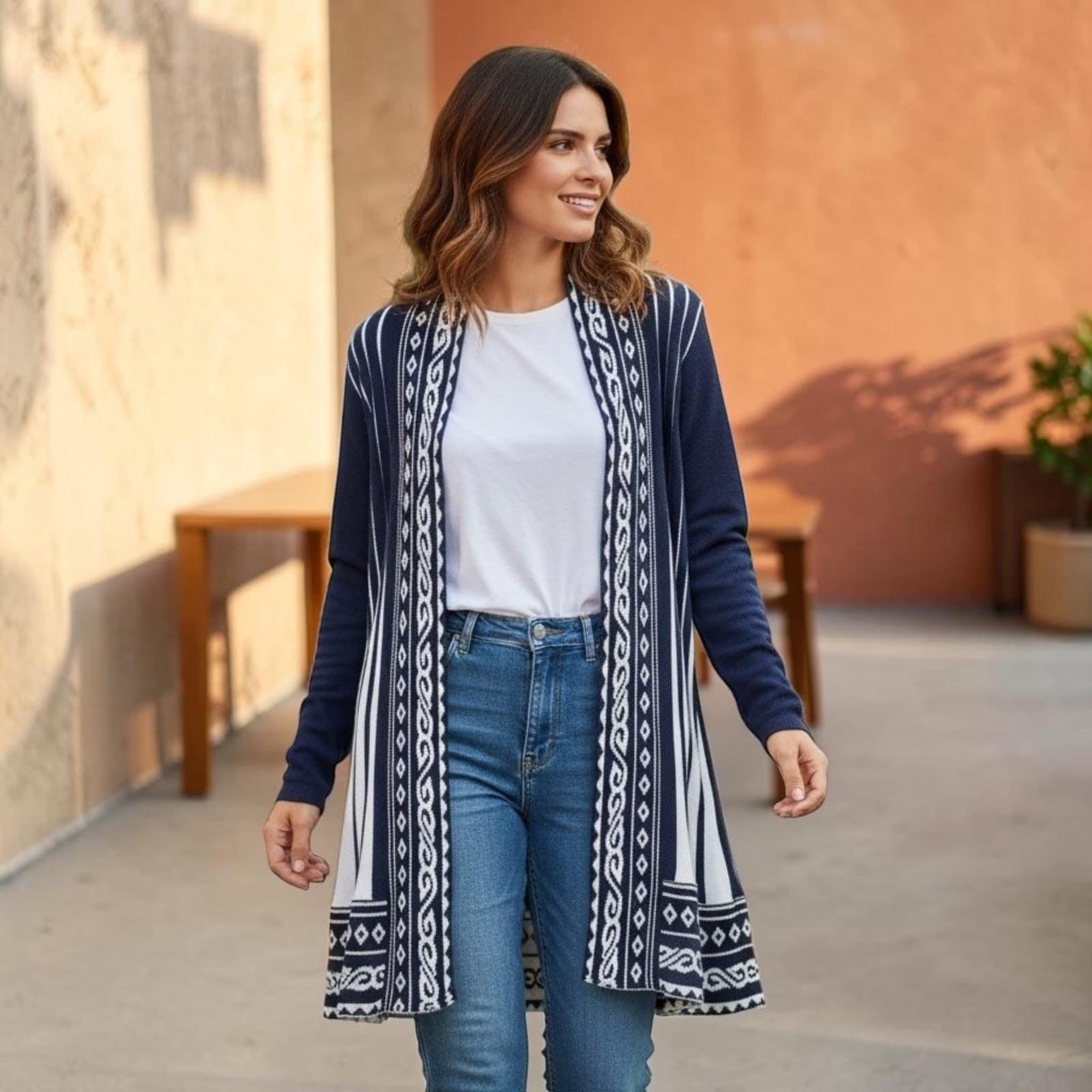 City Center Korian long navy blue shrug with white geometric patterns worn over a white t-shirt and jeans