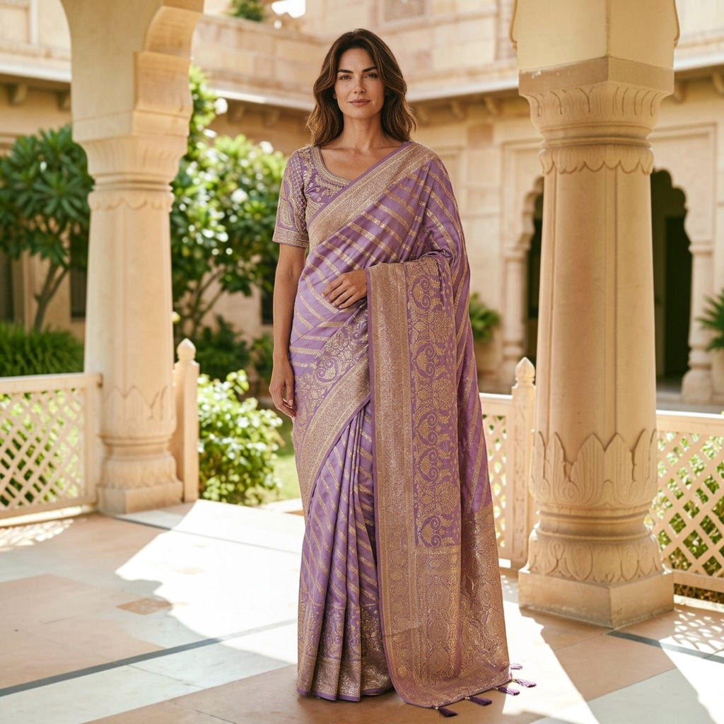 City Center elegant lavender Banarasi saree with gold zari motifs and intricate Aari work blouse on a woman