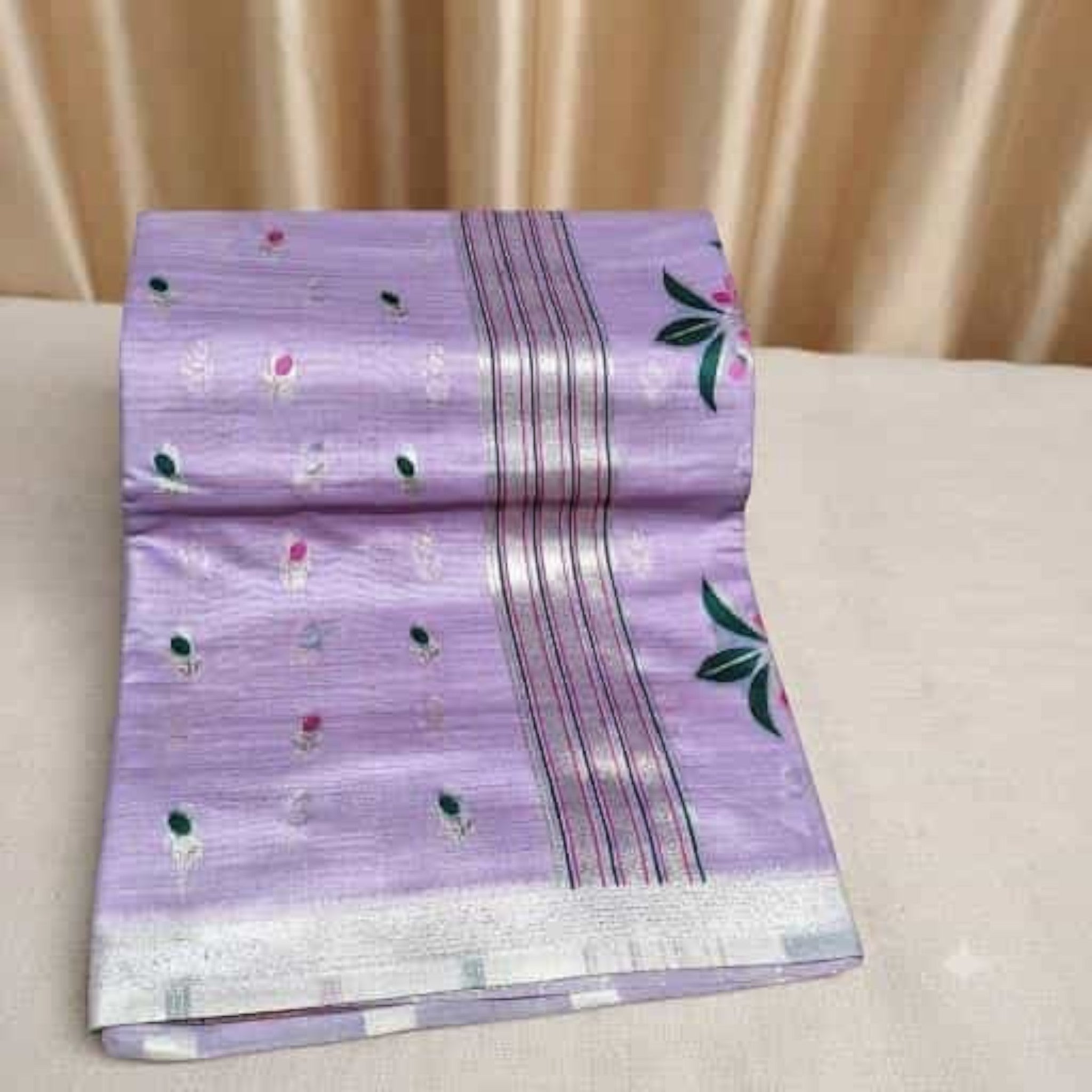 City Center lavender silk Jamdani saree featuring intricate floral motifs and a metallic silver border