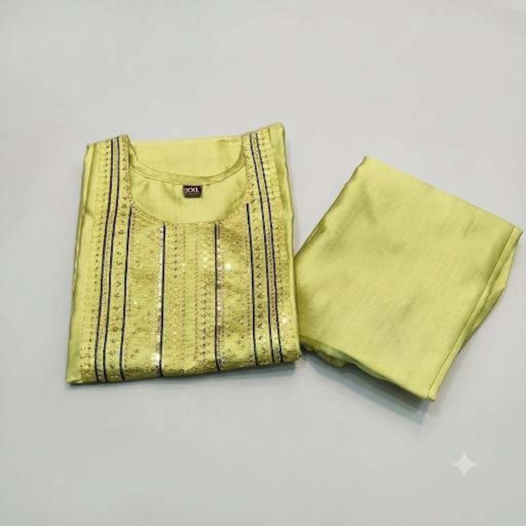 City Center lime green ethnic co-ord set featuring a kurta with intricate sequin embroidery and matching trousers.