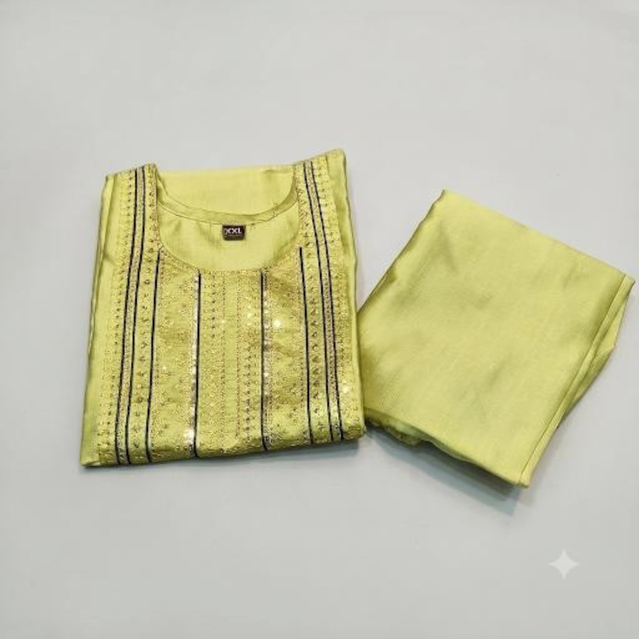 City Center lime green ethnic co-ord set featuring a kurta with intricate sequin embroidery and matching trousers.