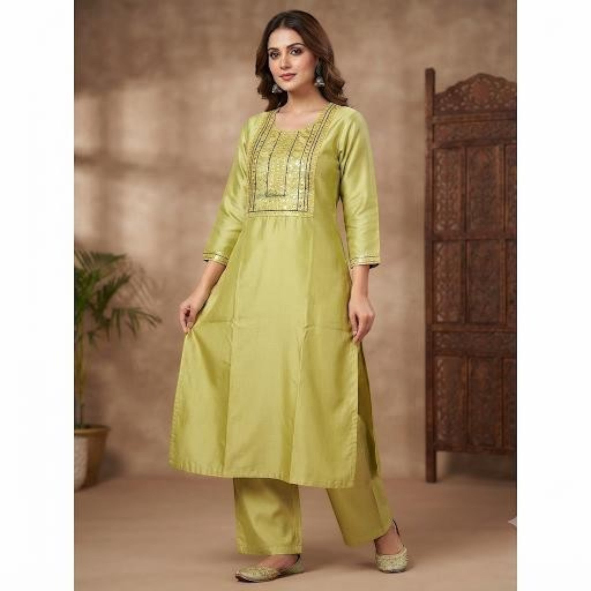 City Center lime green ethnic co-ord set featuring a long kurta with intricate gold embroidery and matching trousers.