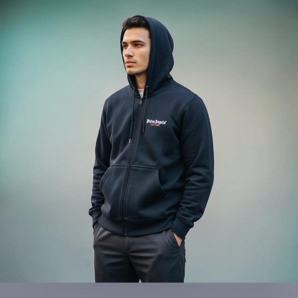 City Center M-LINE black zip-up hoodie worn by a man, featuring a relaxed fit and premium sweatshirt fabric.
