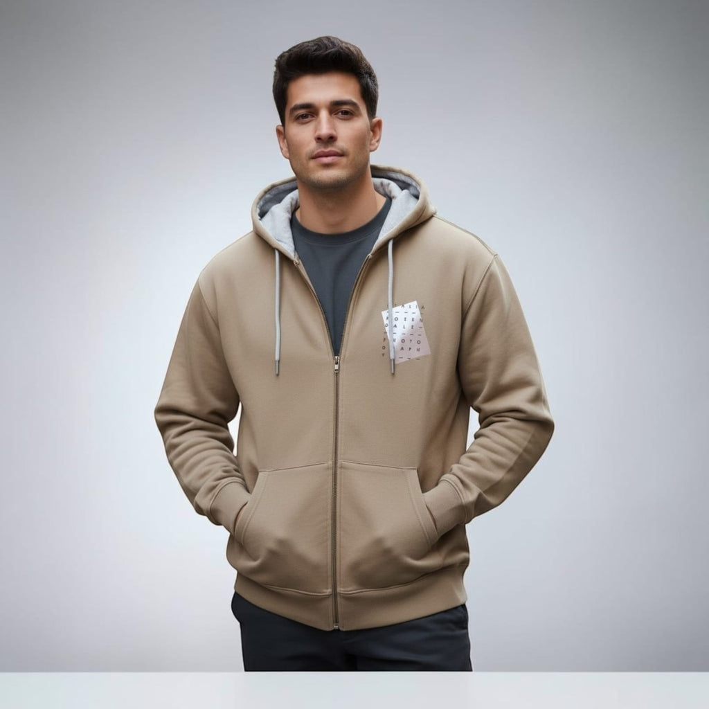 City Center M-LINE men's tan full-zip hoodie with a grey hood lining and kangaroo pockets worn by a male model