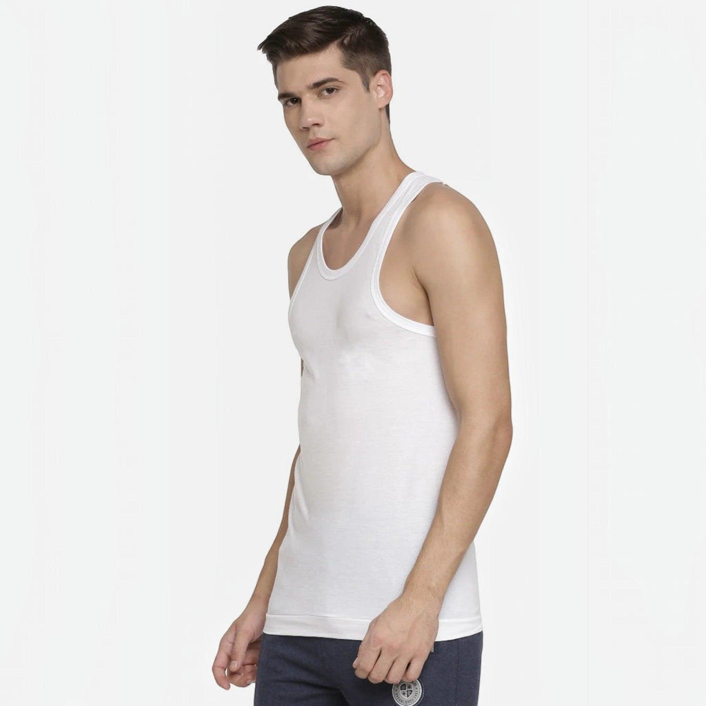 City Center Macroman white seamless cotton vest with a round neck and contoured arm holes worn by a male model