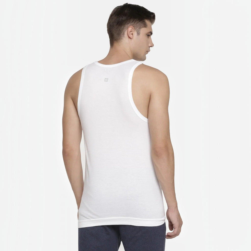 City Center Macroman white seamless cotton vest with round neck and contoured armholes worn by a man from the back