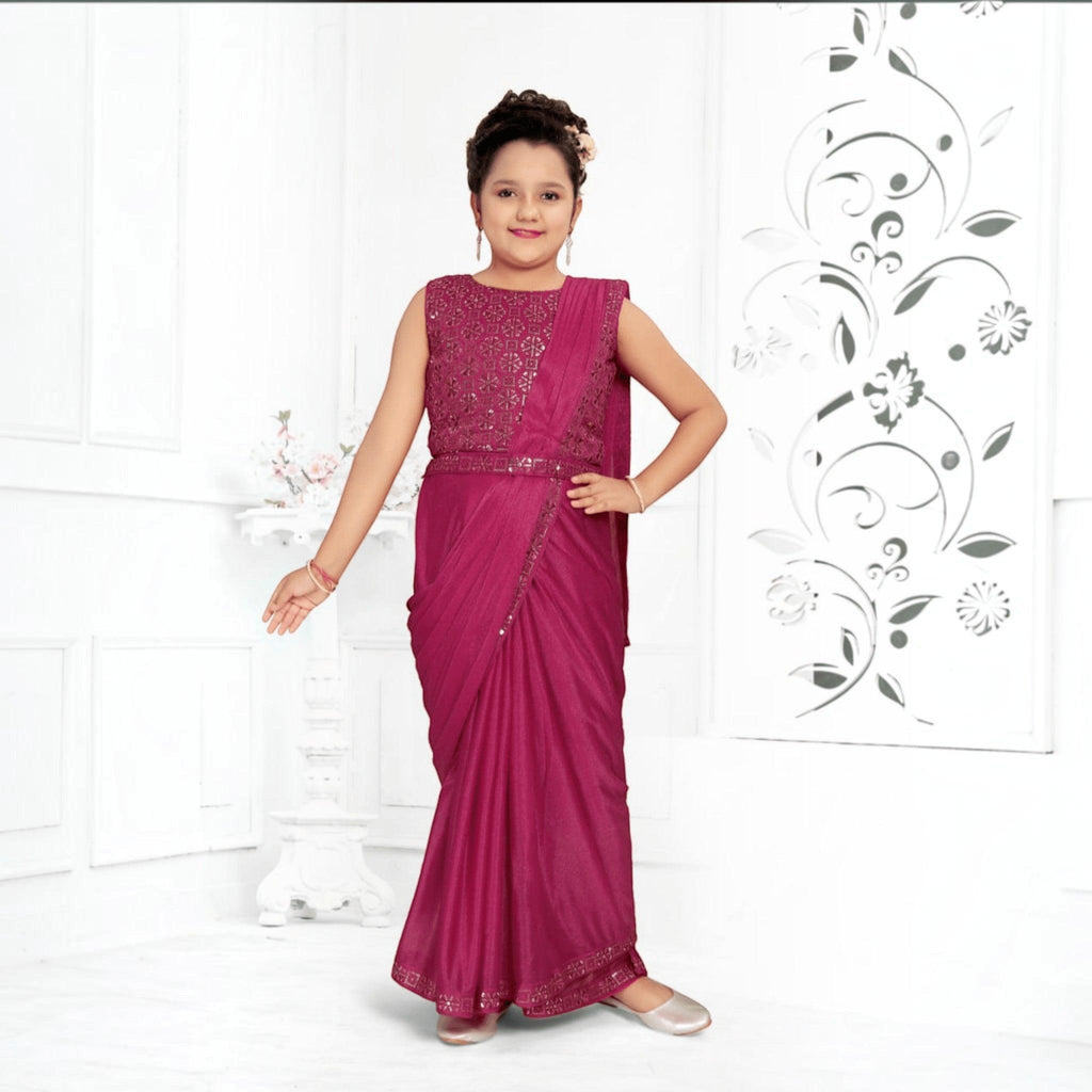City Center girl wearing a magenta shimmer lycra ready-to-wear saree with an embroidered sleeveless blouse