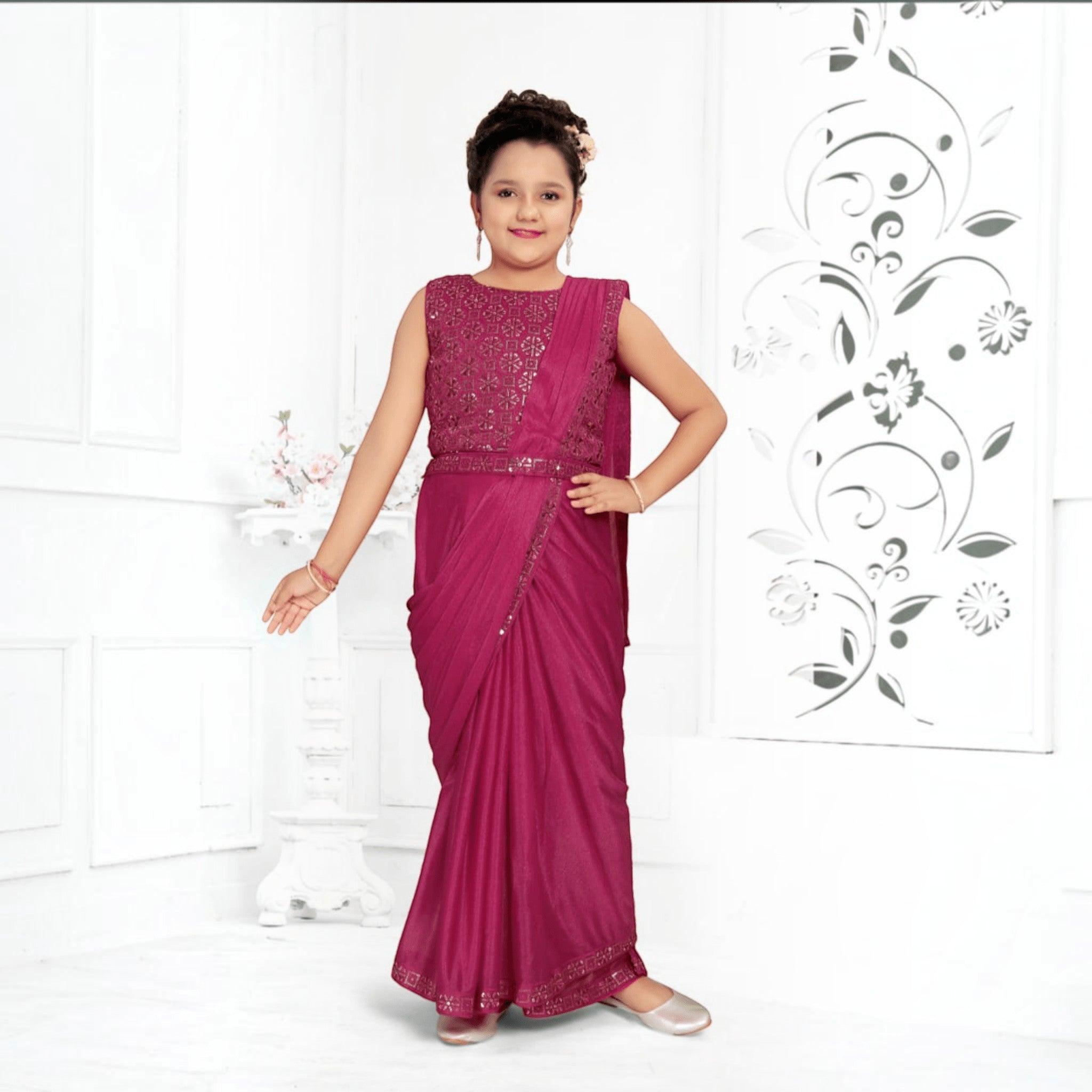 City Center girl wearing a magenta shimmer lycra ready-to-wear saree with an embroidered sleeveless blouse