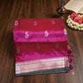City Center handwoven magenta pure silk Paithani saree with silver zari peacock motifs and traditional border