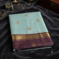 City Center Maheshwari cotton silk saree in mint green with a deep purple border and gold zari floral buti motifs.