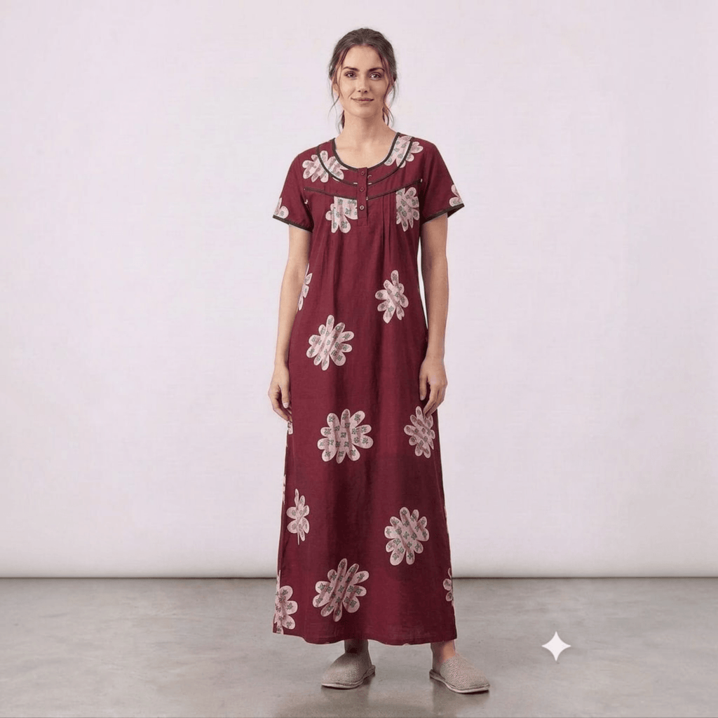 City Center maroon alpine fabric feeding gown with floral print, front pleats, and intricate neck embroidery.