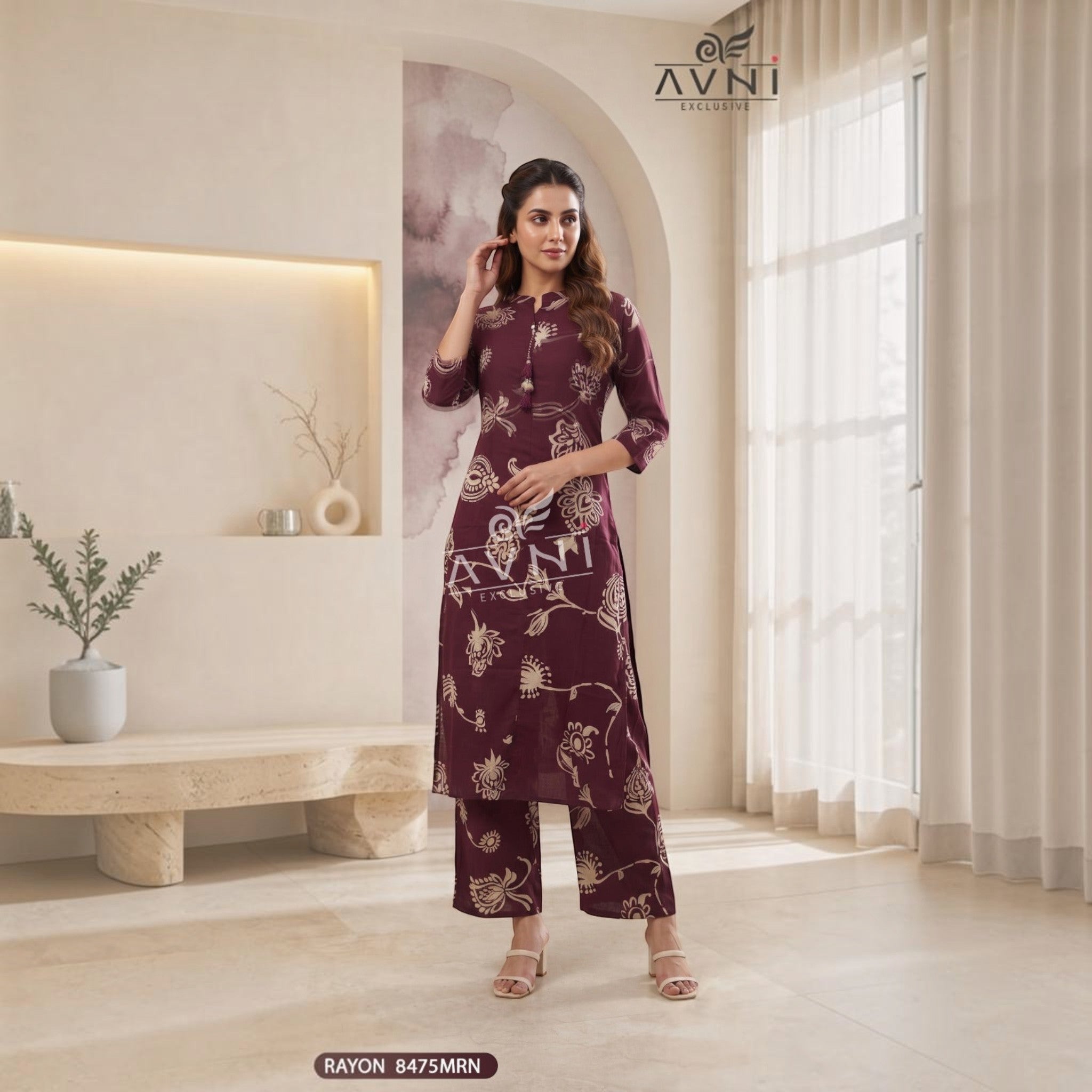 City Center women's maroon rayon ethnic co-ord set with cream floral print, featuring a kurta and matching trousers.