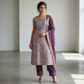 City Center sleeveless kurti and cigarette pant set in mauve with floral print, embroidery, and a matching dupatta.