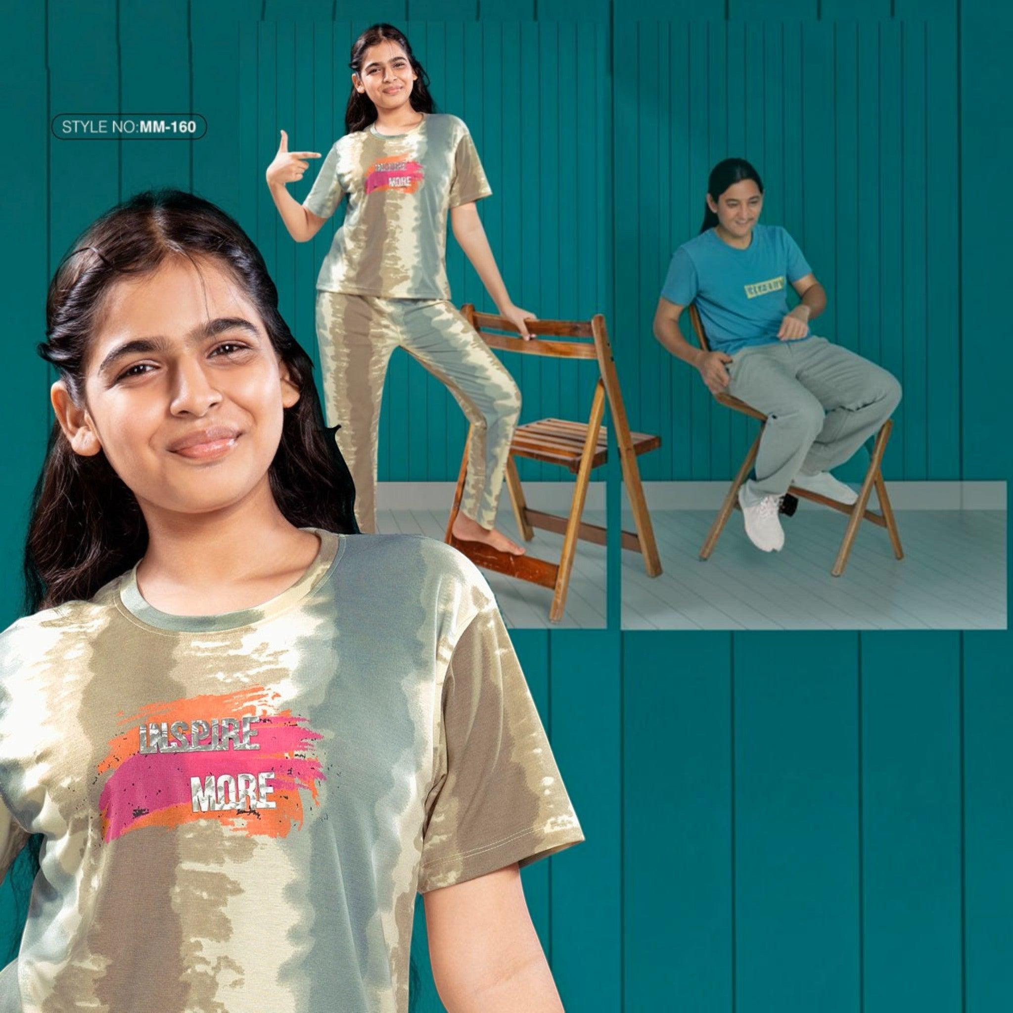 City Center Mawa Girl tie-dye cord set featuring a graphic t-shirt and matching pants worn by a smiling young girl.