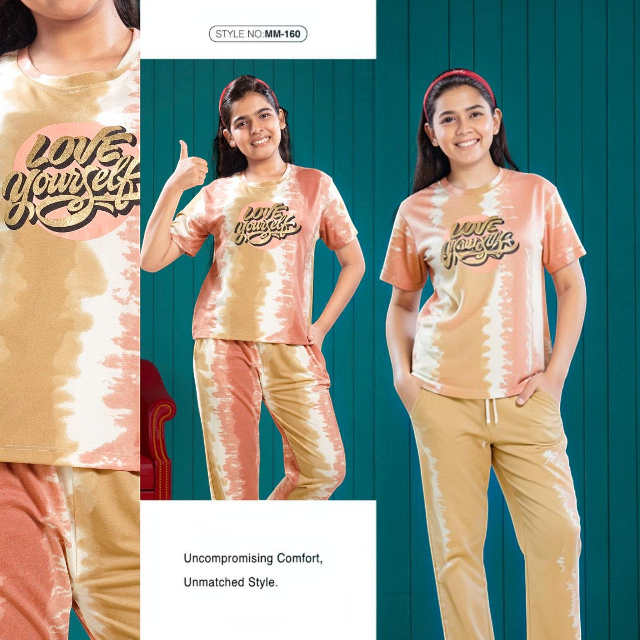 City Center Mawa Girl tie-dye co-ord set featuring a peach and tan t-shirt with Love Yourself graphic and joggers.