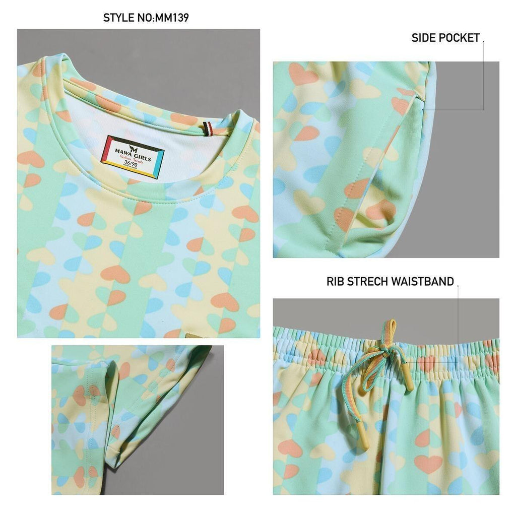 City Center Mawa girls cord set in soft looper fabric with pastel heart pattern, side pockets, and elastic waistband.