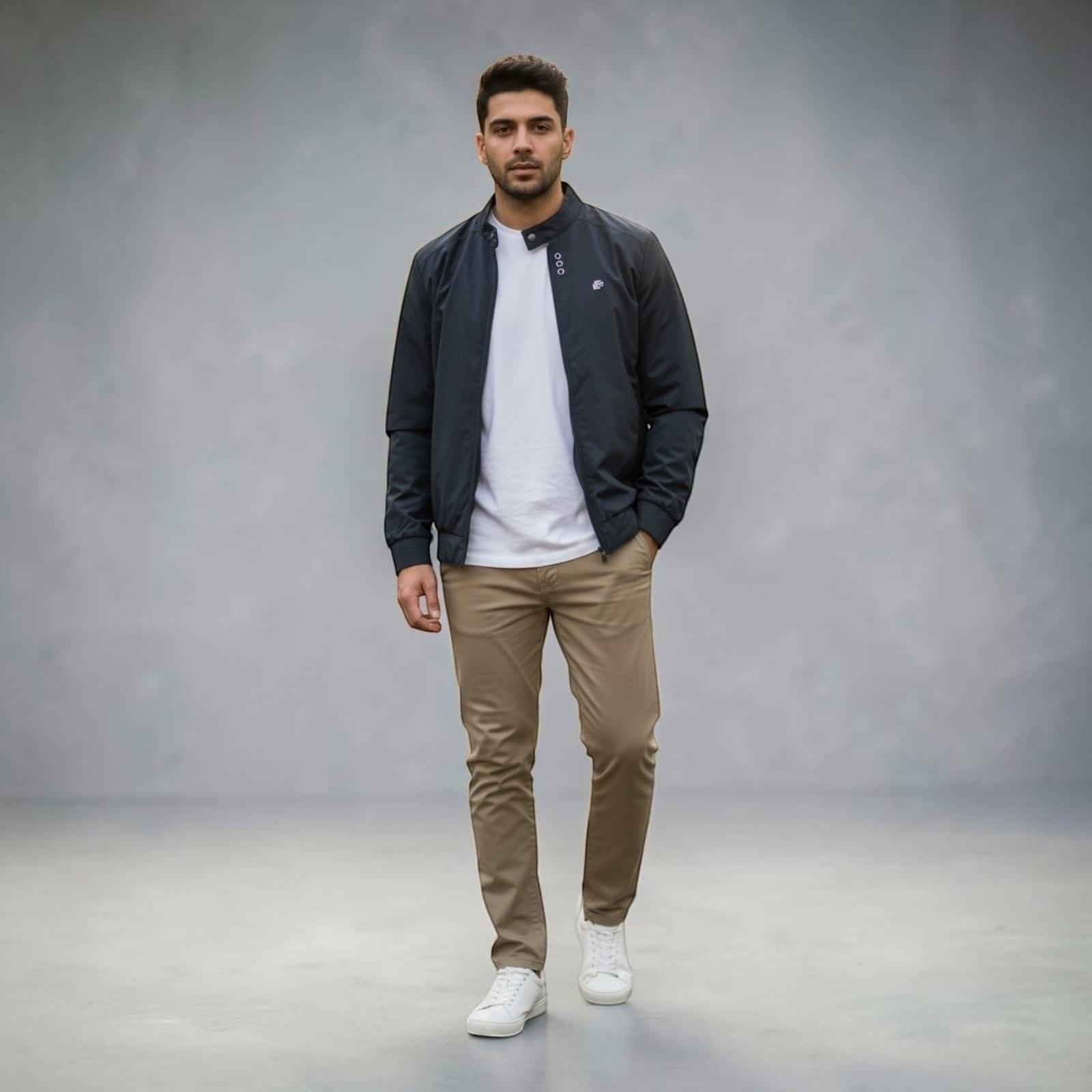 City Center men's black full-zip casual jacket worn over a white t-shirt and khaki chinos in a studio setting