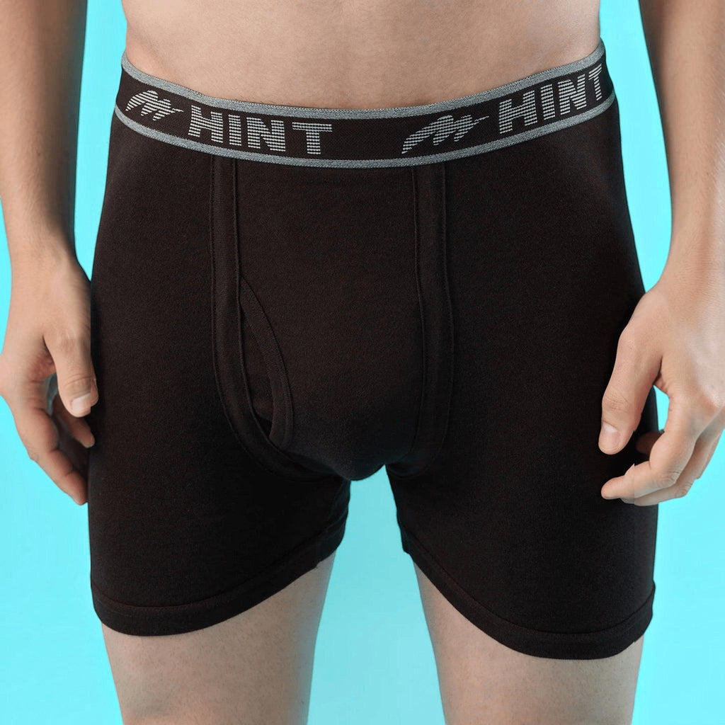 City Center men's black cotton stretch long trunks with an elasticated logo waistband and front opening.