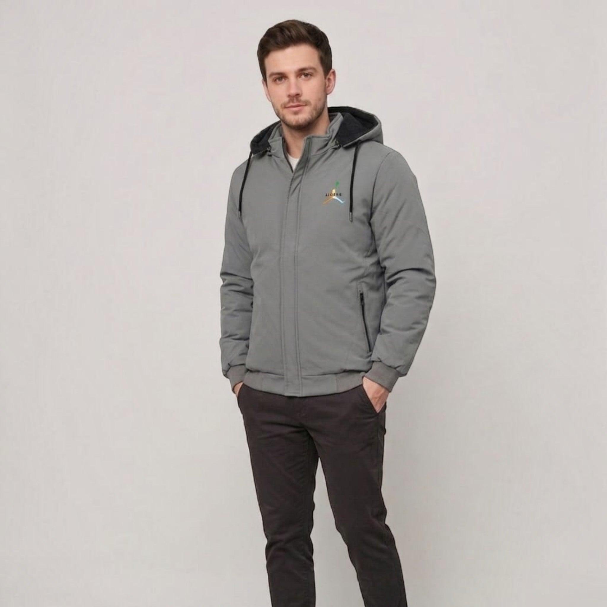 City Center men's grey weather-shield jacket with detachable hood, woolen lining, and zippered pockets on a model.
