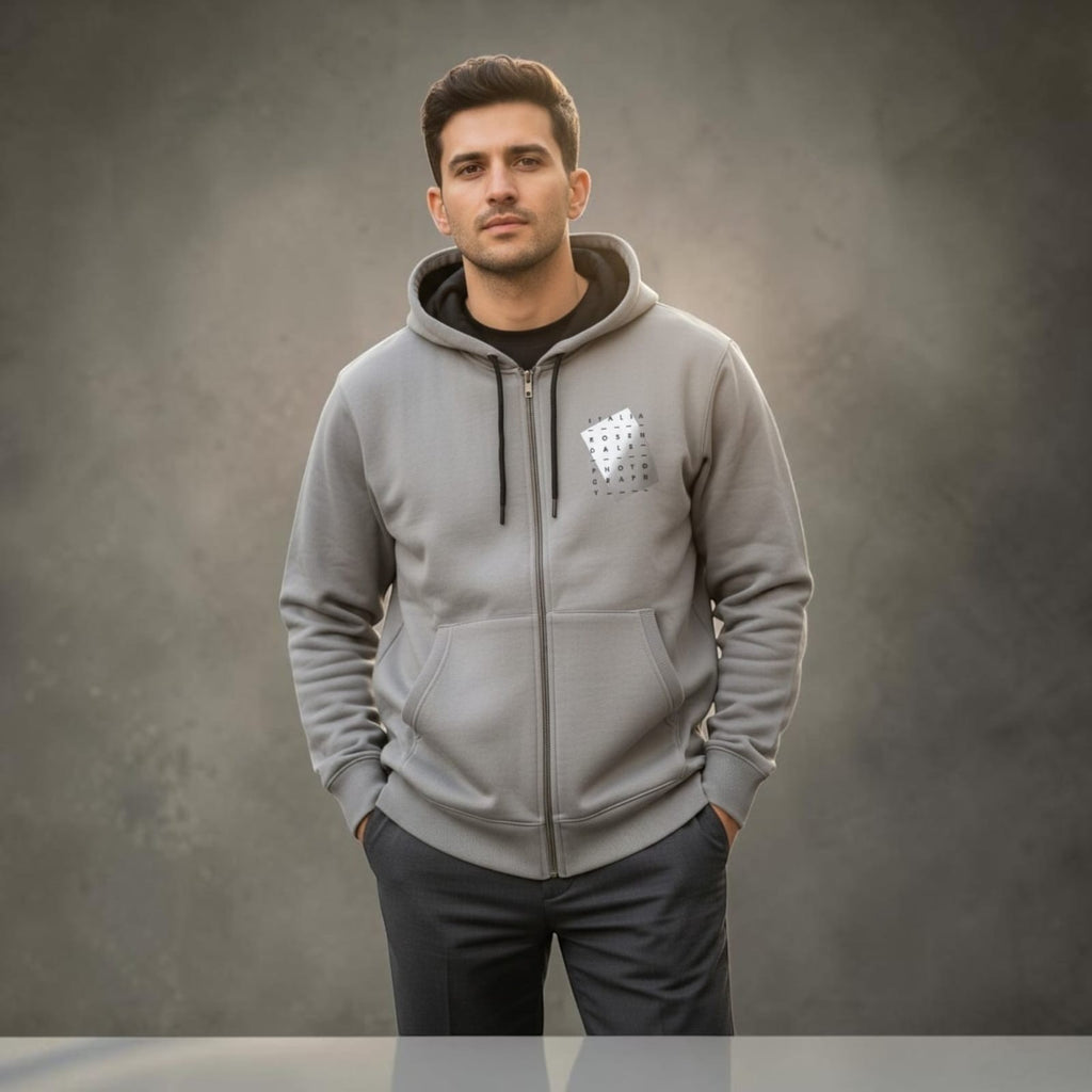 City Center M-LINE men's grey full-zip hoodie with kangaroo pockets worn by a man against a grey background