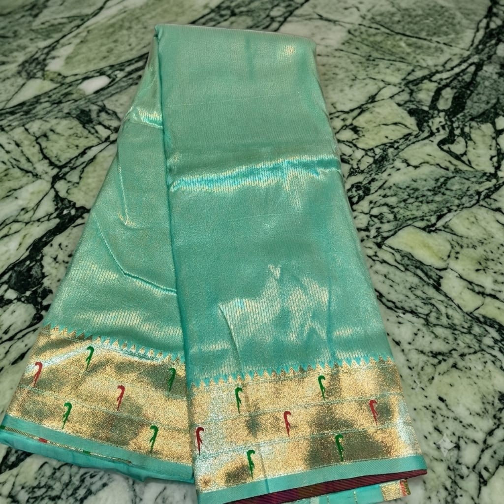 City Center Muniya Paithani silk saree in mint green with gold zari border and traditional parrot motifs