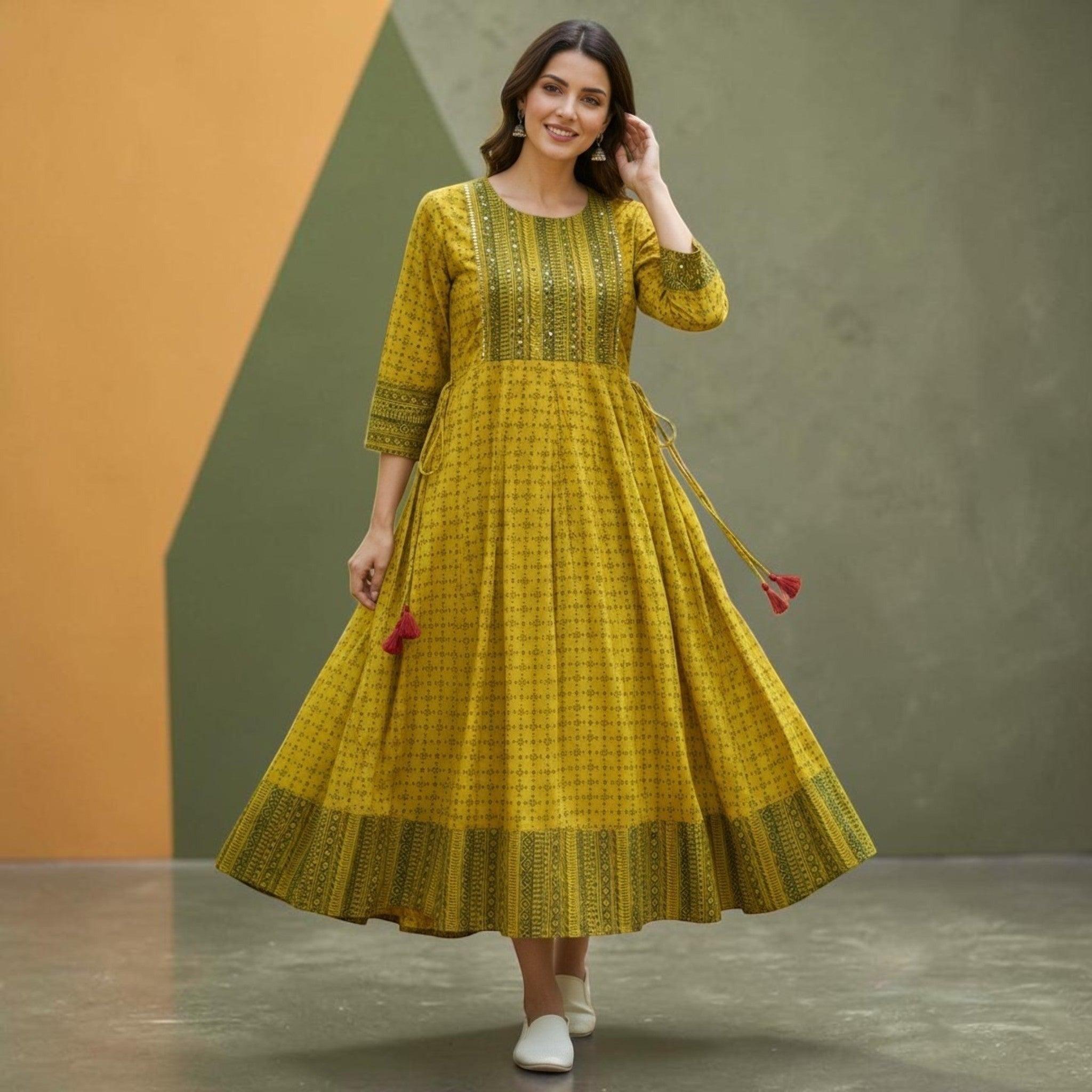 City Center mustard yellow Anarkali kurti with intricate ethnic print, three-quarter sleeves, and a flared silhouette.