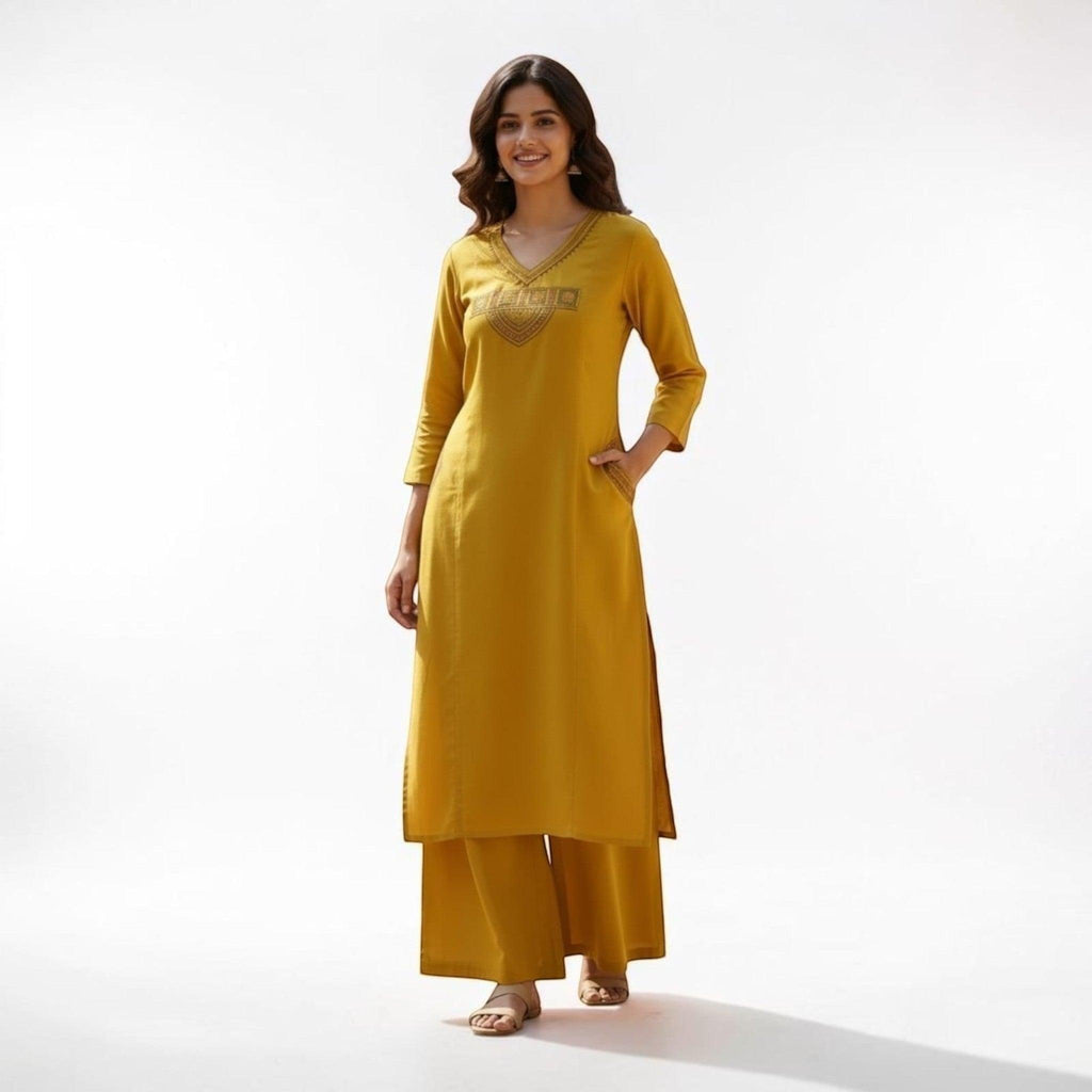 City Center mustard yellow straight-cut kurta and wide-leg pant set with V-neckline and intricate ethnic embroidery.