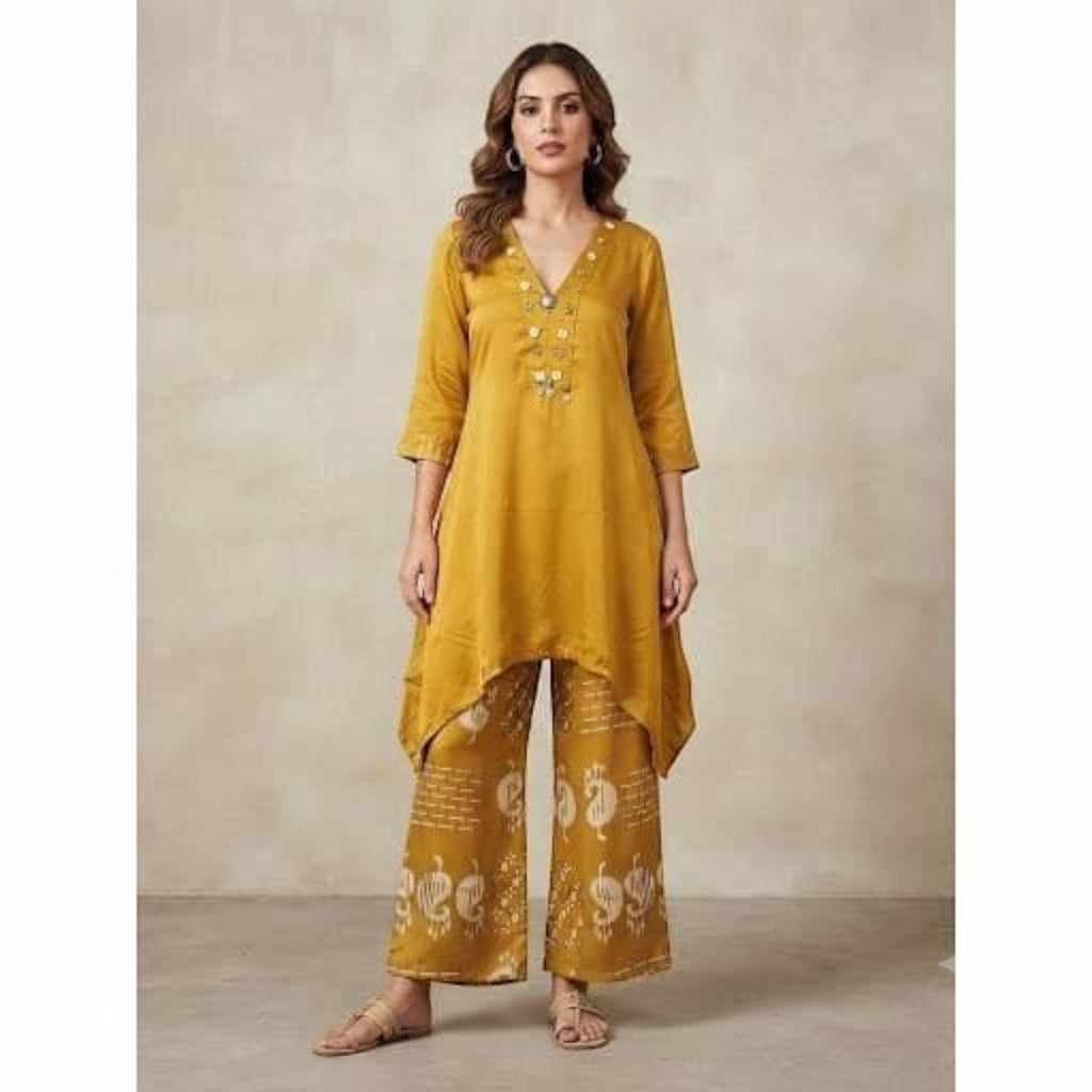 City Center mustard yellow co-ord set with a V-neck tunic and wide-leg patterned trousers on a model