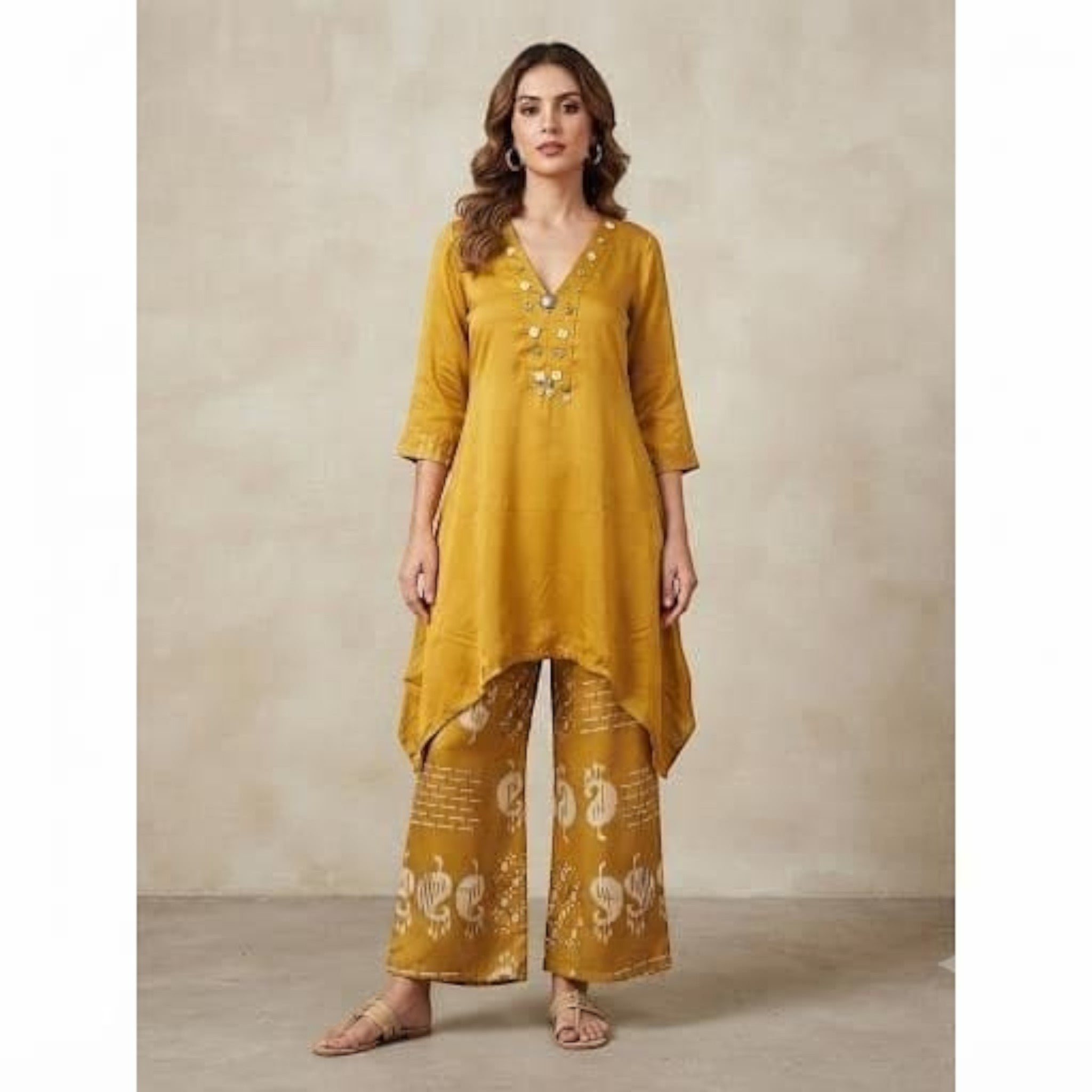 City Center mustard yellow co-ord set with a V-neck tunic and wide-leg patterned trousers on a model
