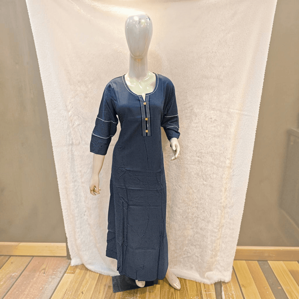 City Center heavy rayon A-line gown in navy blue with white polka dots, three-quarter sleeves, and button-down detail.