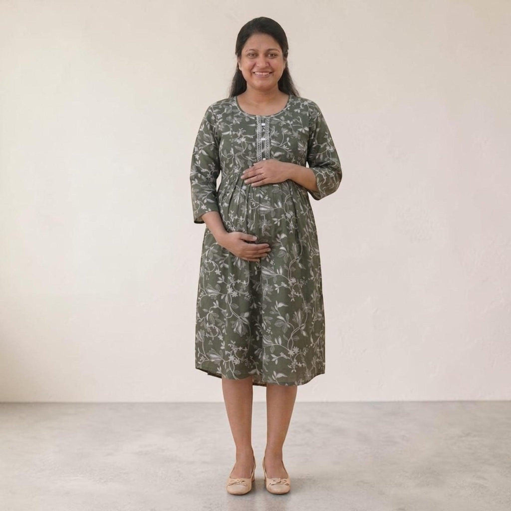 City Center maternity and nursing gown in olive green cotton with a white floral print and concealed feeding zippers.