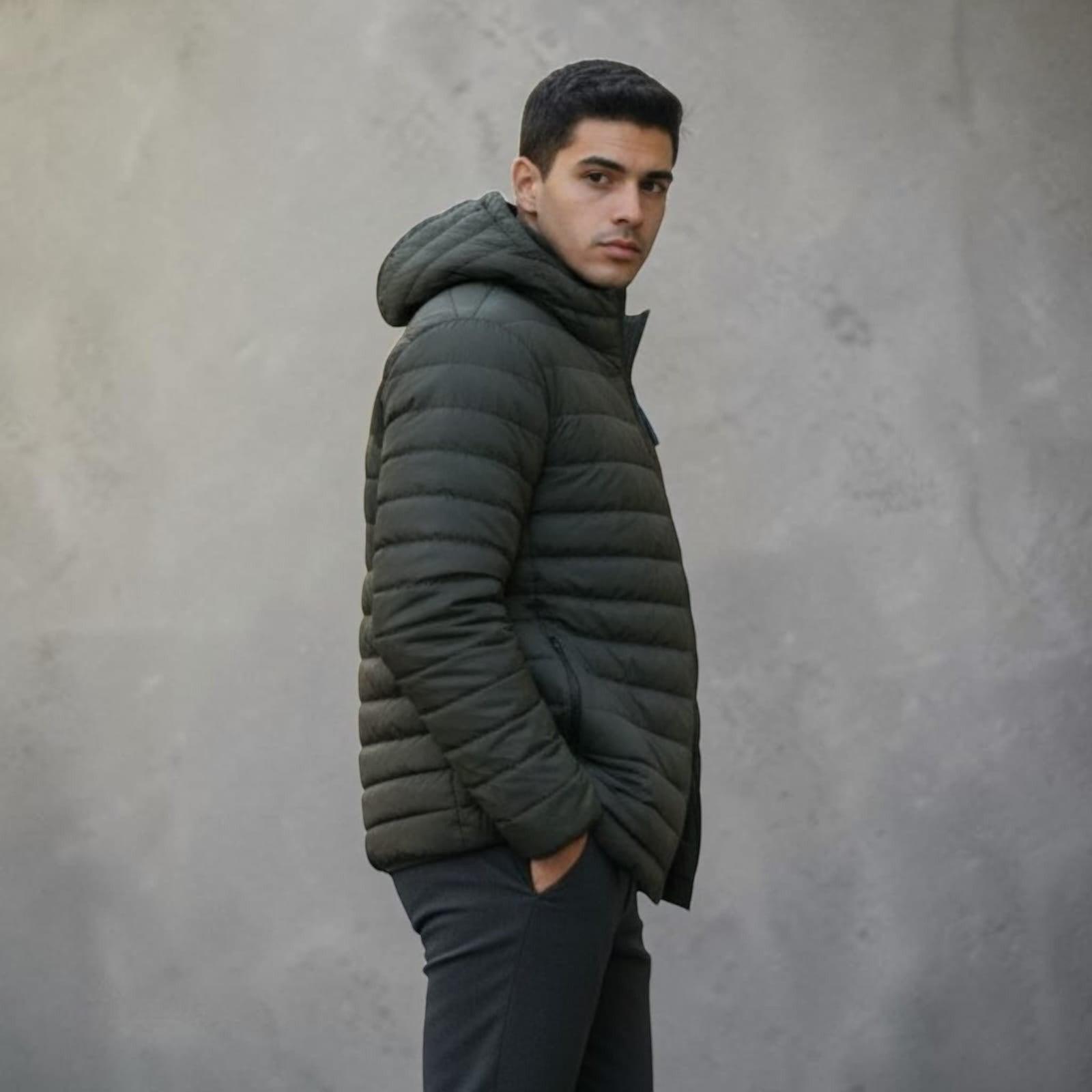 City Center Men's Bomber Jacket Feather Touch GD20 in olive green with a hood, worn by a man against a grey background.