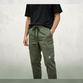 City Center men's olive green cargo pants with an elastic drawstring waistband and side utility pockets.