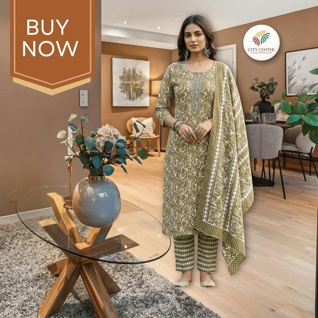 City Center cotton kurti set in olive green with white heritage Jaipuri leaf print, worn by a model in a home setting.