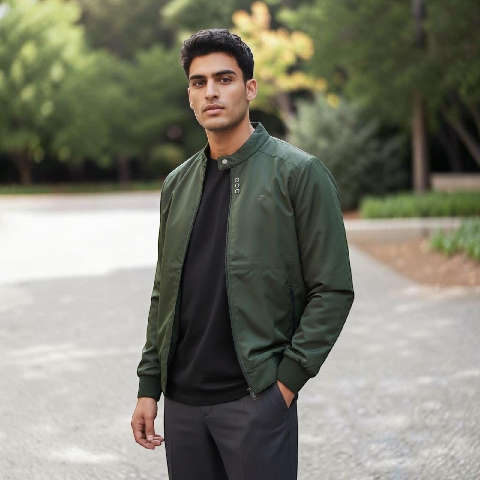 City Center men's olive green full-zip casual jacket with a refined collar, worn over a black tee in an outdoor setting.